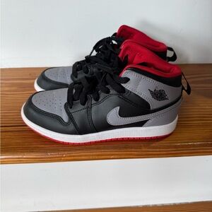 Nike Kids Black and Gray Sneakers with Red Accents